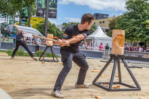 Michael Trow in a log chopping competition