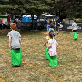 Sack racing competitors